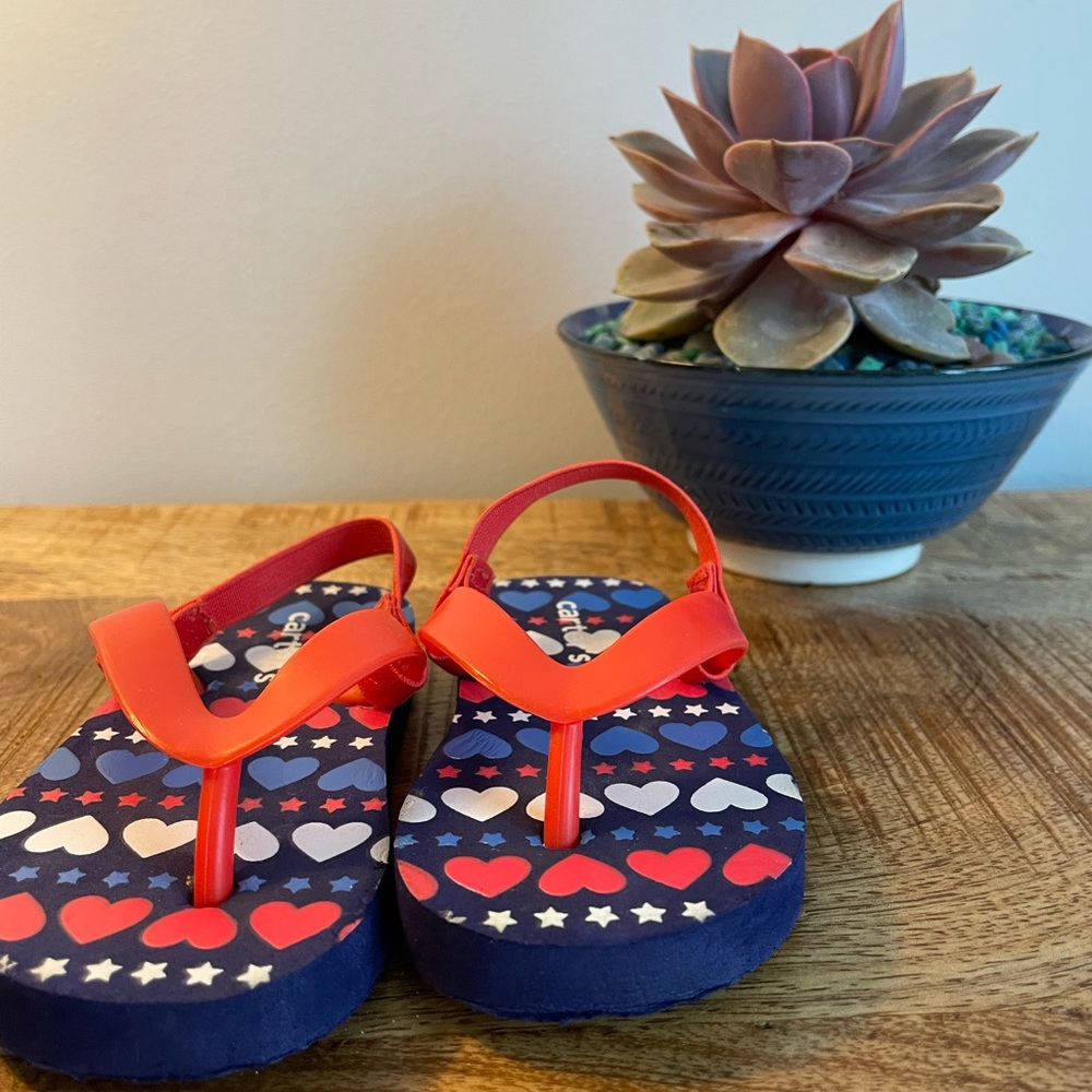 Carter Toddler size 3-4 red, white and blue flip-flops with ankle elastic.